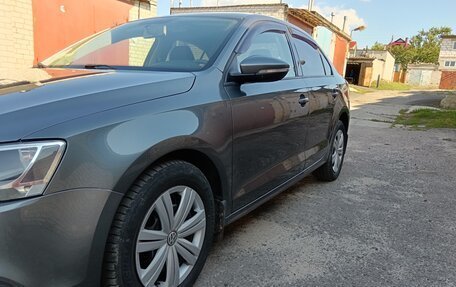 Volkswagen Jetta VI, 2011 год, 970 000 рублей, 13 фотография