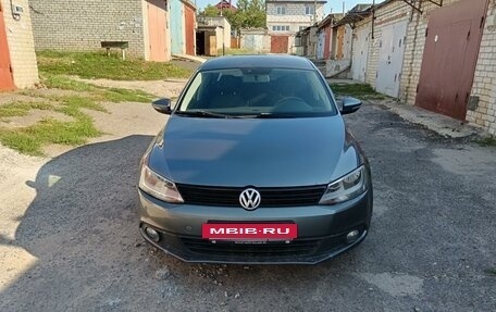 Volkswagen Jetta VI, 2011 год, 970 000 рублей, 3 фотография