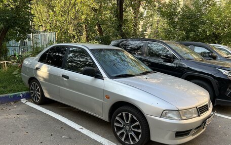 Mitsubishi Lancer VII, 1999 год, 490 000 рублей, 2 фотография