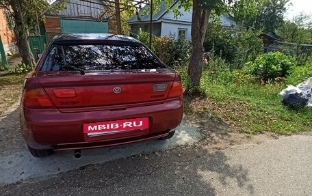 Mazda 323, 1997 год, 289 000 рублей, 11 фотография