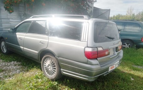 Nissan Stagea II, 1999 год, 600 000 рублей, 3 фотография