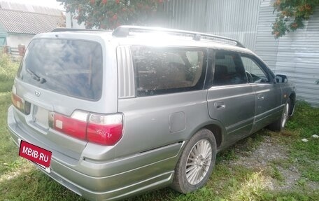 Nissan Stagea II, 1999 год, 600 000 рублей, 2 фотография