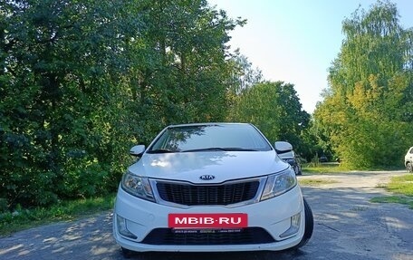 KIA Rio III рестайлинг, 2014 год, 17 фотография