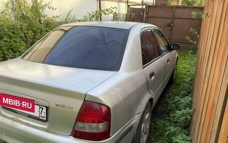 Mazda 323, 1999 год, 105 000 рублей, 10 фотография