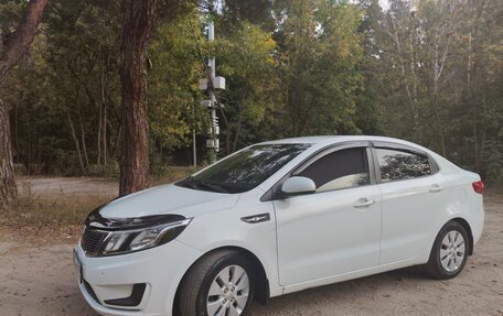 KIA Rio III рестайлинг, 2013 год, 665 000 рублей, 20 фотография