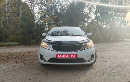 KIA Rio III рестайлинг, 2013 год, 665 000 рублей, 13 фотография