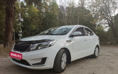 KIA Rio III рестайлинг, 2013 год, 665 000 рублей, 19 фотография