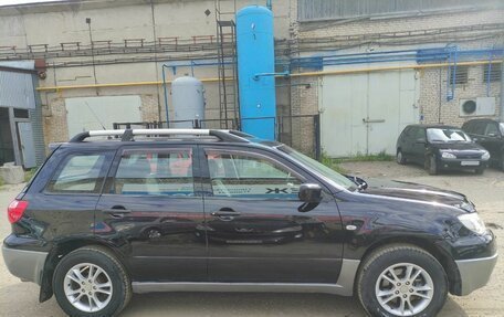 Mitsubishi Outlander III рестайлинг 3, 2007 год, 700 000 рублей, 4 фотография