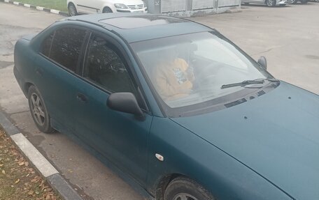 Mitsubishi Carisma I, 1996 год, 295 000 рублей, 1 фотография