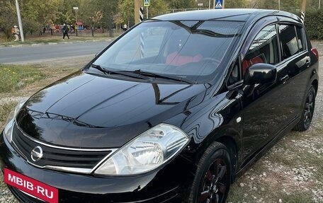 Nissan Tiida, 2010 год, 975 000 рублей, 1 фотография