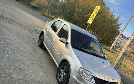 Renault Logan I, 2012 год, 335 000 рублей, 3 фотография