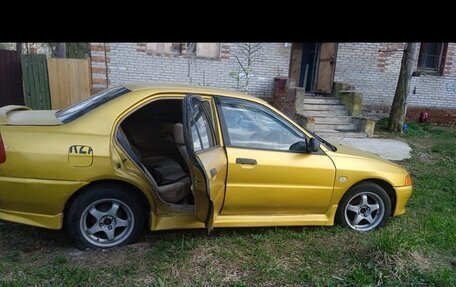 Mitsubishi Lancer VII, 1997 год, 160 000 рублей, 3 фотография