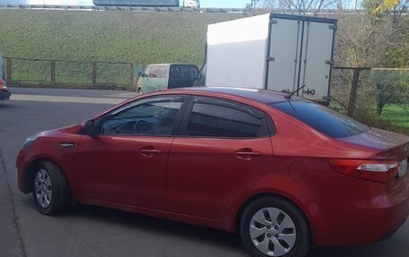 KIA Rio III рестайлинг, 2011 год, 750 000 рублей, 9 фотография