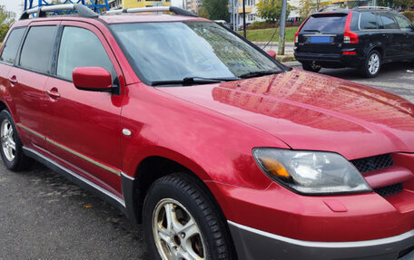 Mitsubishi Outlander III рестайлинг 3, 2004 год, 700 000 рублей, 7 фотография