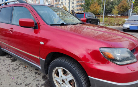 Mitsubishi Outlander III рестайлинг 3, 2004 год, 700 000 рублей, 15 фотография