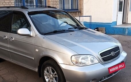 KIA Carnival III, 2004 год, 450 000 рублей, 3 фотография