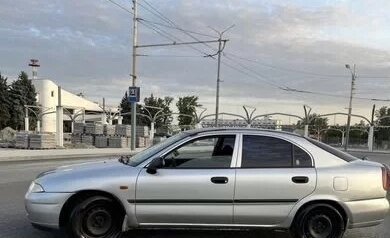 Mitsubishi Carisma I, 1999 год, 370 000 рублей, 9 фотография