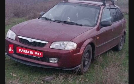 Mazda 323, 1999 год, 249 000 рублей, 10 фотография