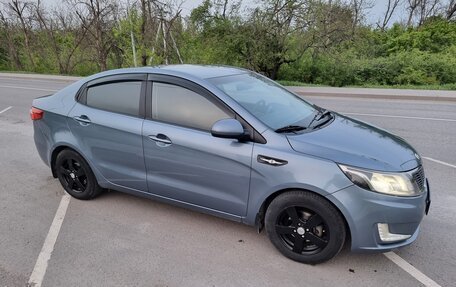 KIA Rio III рестайлинг, 2013 год, 1 060 000 рублей, 2 фотография