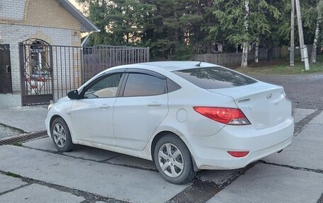 Hyundai Solaris II рестайлинг, 2011 год, 680 000 рублей, 5 фотография