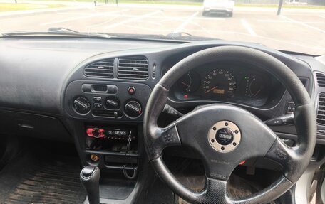 Mitsubishi Mirage VI рестайлинг, 1998 год, 249 000 рублей, 17 фотография