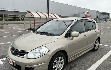 Nissan Tiida, 2010 год, 870 000 рублей, 8 фотография