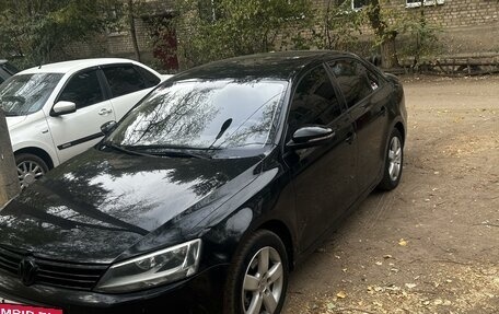 Volkswagen Jetta VI, 2011 год, 950 000 рублей, 3 фотография