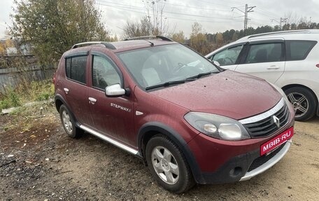 Renault Sandero I, 2013 год, 870 000 рублей, 2 фотография