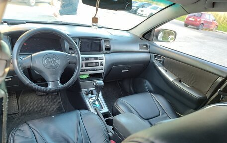 Toyota Corolla, 2004 год, 569 000 рублей, 7 фотография