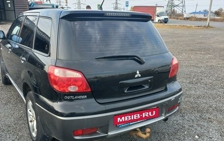 Mitsubishi Outlander III рестайлинг 3, 2004 год, 599 000 рублей, 4 фотография