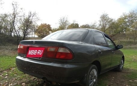 Mazda Familia, 1996 год, 249 000 рублей, 4 фотография