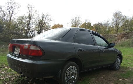 Mazda Familia, 1996 год, 249 000 рублей, 11 фотография