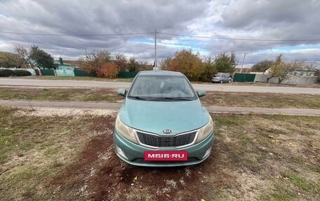 KIA Rio III рестайлинг, 2013 год, 700 000 рублей, 3 фотография