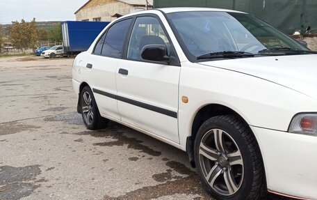 Mitsubishi Lancer VII, 1998 год, 324 000 рублей, 4 фотография