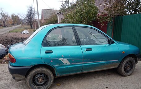 Mazda 121 II, 1991 год, 125 000 рублей, 2 фотография