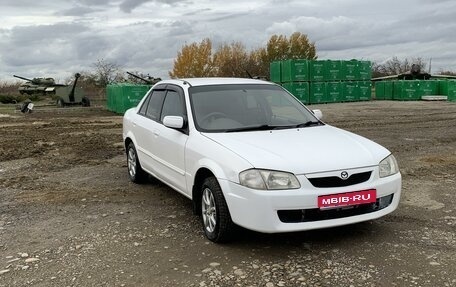 Mazda Familia, 1999 год, 430 000 рублей, 1 фотография