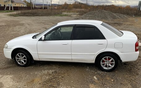 Mazda Familia, 1999 год, 430 000 рублей, 4 фотография