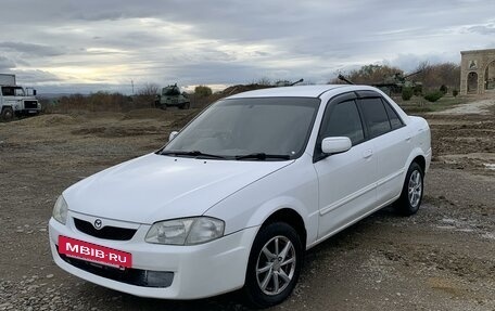 Mazda Familia, 1999 год, 430 000 рублей, 3 фотография