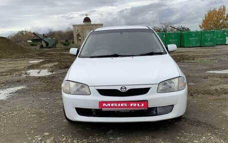 Mazda Familia, 1999 год, 430 000 рублей, 2 фотография