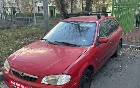 Mazda 323, 1999 год, 159 000 рублей, 9 фотография