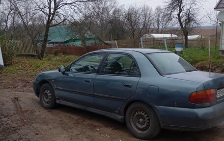 Mitsubishi Carisma I, 1998 год, 260 000 рублей, 18 фотография