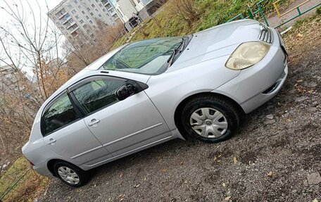 Toyota Corolla, 2004 год, 630 000 рублей, 10 фотография