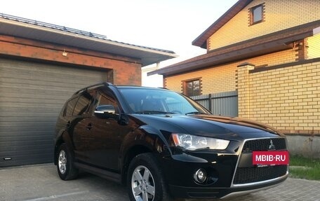 Mitsubishi Outlander III рестайлинг 3, 2011 год, 1 495 000 рублей, 4 фотография