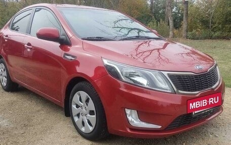 KIA Rio III рестайлинг, 2012 год, 820 000 рублей, 21 фотография