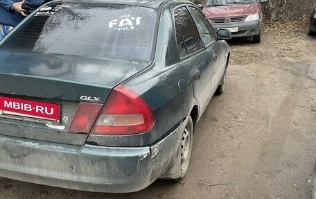 Mitsubishi Lancer VII, 1997 год, 130 000 рублей, 5 фотография