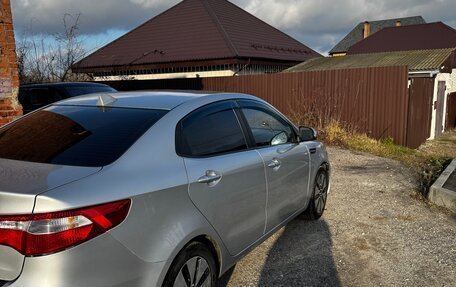 KIA Rio III рестайлинг, 2012 год, 1 040 000 рублей, 18 фотография