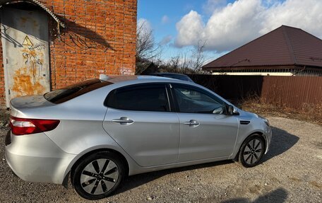 KIA Rio III рестайлинг, 2012 год, 1 040 000 рублей, 17 фотография