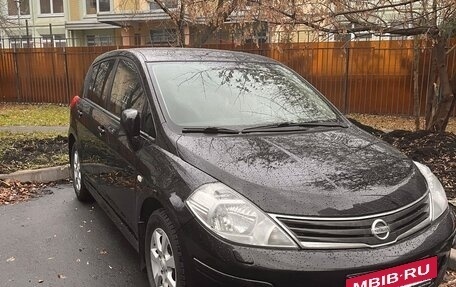 Nissan Tiida, 2010 год, 870 000 рублей, 8 фотография