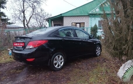 Hyundai Solaris II рестайлинг, 2012 год, 850 000 рублей, 10 фотография