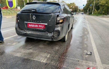 Renault Laguna III рестайлинг, 2010 год, 3 фотография